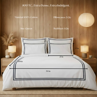 White bedding set with dimensions and material details on a wooden bed frame.